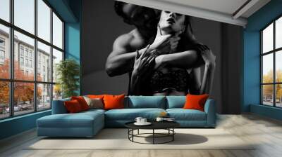 attractive belovers in underwear. Black and white close-up of a man and a woman. passion concept Wall mural