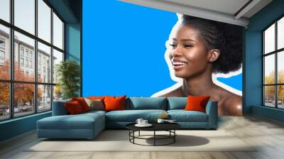 Beauty Woman With Afro Hairstyle Smiles Happily, Close Up Profile View, Cute Model Of African American Ethnic In Beauty Skin And Hair Concept, Copy Spase On Left Wall mural