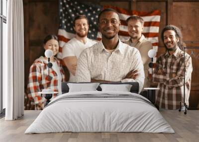 Diverse American Patriotic Team Standing On Of American's Flag Back Wall mural