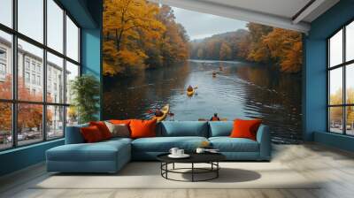 people kayaking on a calm river during fall Wall mural