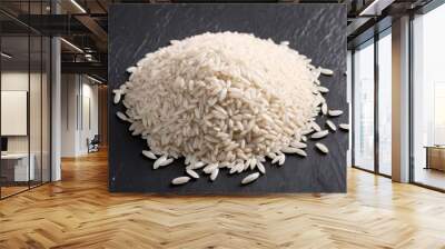  Pile of white rice grains on dark surface Wall mural