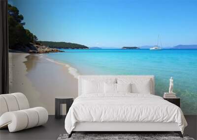  Tranquil beach getaway under a clear sky Wall mural