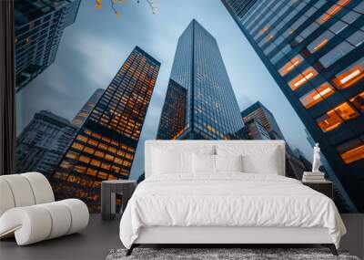 A view of a high rise glass building and a dark steel window system on a blue clear sky background. A business concept of future architecture, looking up to the sun's light on top of the building. 3D Wall mural