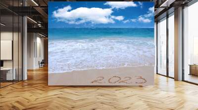 New Year 2023 is coming concept on tropical beach. Wall mural