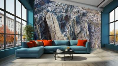 Rough texture of mountain wild stone. Abstract stone background. Wall mural