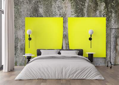 Yellow memo stick on old wall background Wall mural