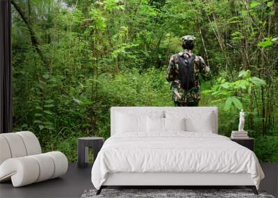 behind the  forest ranger patrol into the jungle,smart patrol system. Wall mural