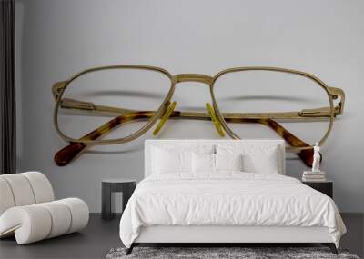 old glasses closeup with gold frame Wall mural