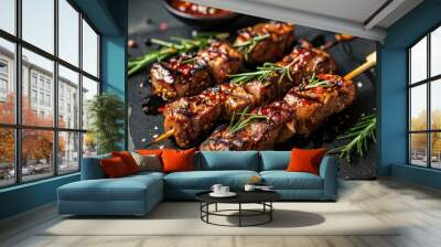 Grilled meat skewers on a black slate. This photo is great for advertising restaurants, cooking blogs, or food magazines. Wall mural