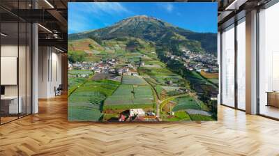 Aerial view of the Nepal van java is a Rural tour on the slopes of mount sumbing, The beauty of building houses in the countryside of the mountainside. Magelang, Indonesia Wall mural