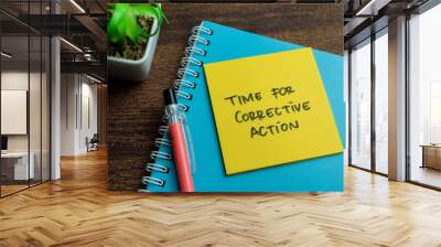 Concept of Time for Corrective Action write on sticky notes isolated on Wooden Table. Wall mural