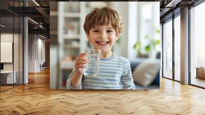 Happy Boy Drinking Glass Of Water Standing On kitchen Background Wall mural