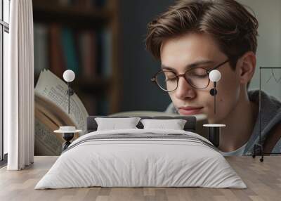 Portrait of a student reading a book Wall mural