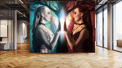 Two sides of a human being. Evil and kind sides of a woman photo. Wall mural