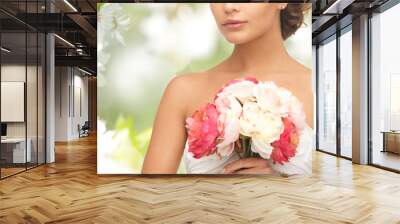 bride or woman with bouquet of flowers Wall mural