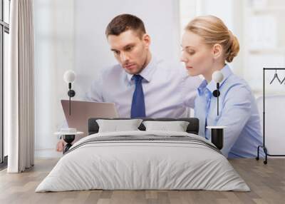 business team working with laptop in office Wall mural