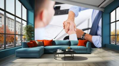 businessmen shaking hands in office Wall mural