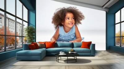 childhood, school and education concept - happy smiling little african american girl reading book over grey background Wall mural