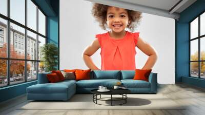 childhood and people concept - happy little african american girl over grey background Wall mural