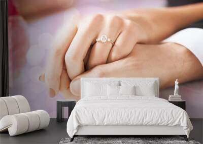 close up of couple hands with engagement ring Wall mural