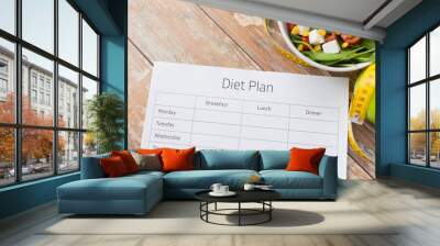 close up of diet plan and food on table Wall mural