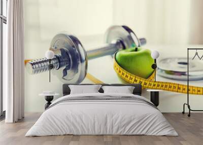 close up of dumbbell and apple with measuring tape Wall mural