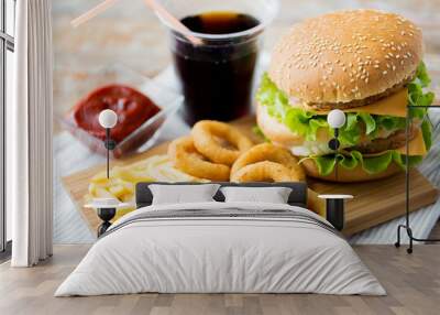 close up of fast food snacks and drink on table Wall mural