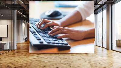 close up of female hands typing on keyboard Wall mural