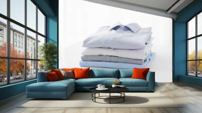 close up of ironed and folded shirts on table Wall mural