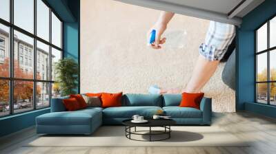 close up of male cleaning stain on carpet Wall mural