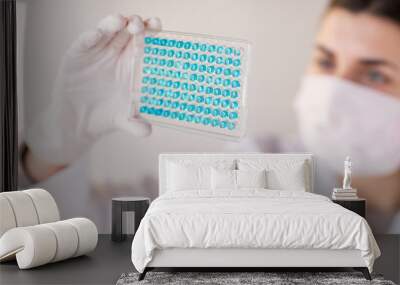 close up of scientist making test in lab Wall mural