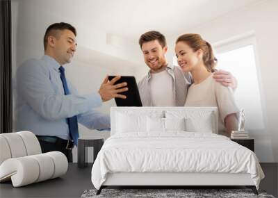 couple and realtor with tablet pc at new home Wall mural