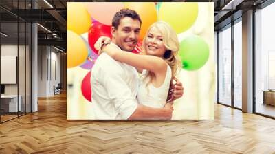 couple with colorful balloons Wall mural