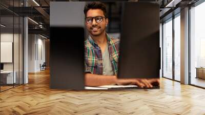 deadline, technology and people concept - close up of creative man in glasses working at night office and thinking Wall mural