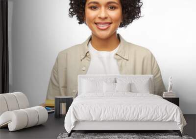 eco living, environment and sustainability concept - portrait of happy smiling woman holding green recycling sign and alkaline batteries over white background Wall mural