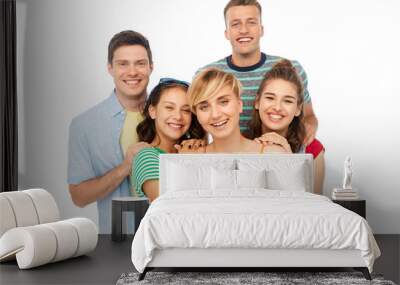 friendship and people concept - group of happy smiling friends over white background Wall mural