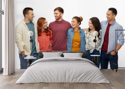 friendship and people concept - group of smiling friends over white background Wall mural