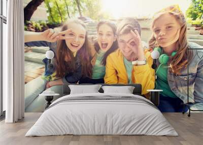 friendship and people concept - happy teenage friends or high school students having fun and making faces Wall mural