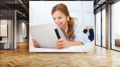 girl with tablet pc at home Wall mural