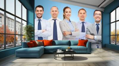 group of happy businesspeople with crossed arms Wall mural