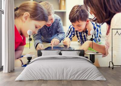 group of school kids with tablet pc in classroom Wall mural