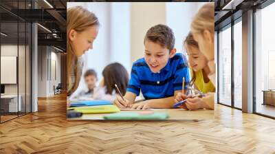 group of students talking and writing at school Wall mural