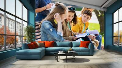 group of students with notebooks at school yard Wall mural