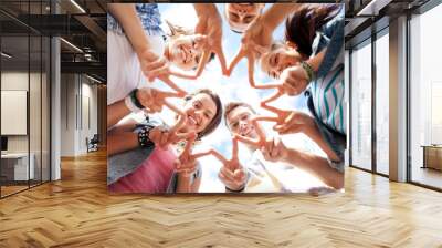 group of teenagers showing finger five Wall mural