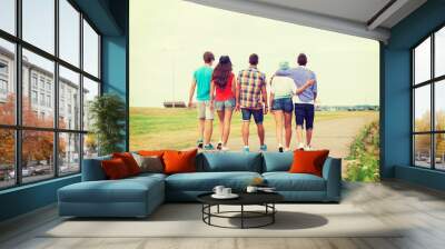 group of teenagers walking outdoors from back Wall mural