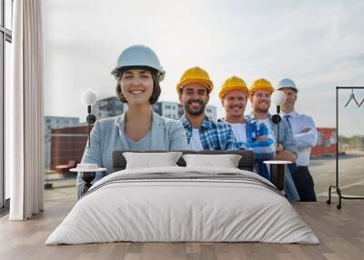 happy builders and architect at construction site Wall mural