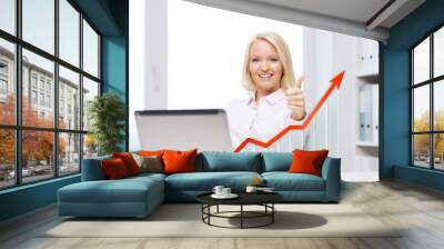 happy businesswoman with laptop showing thumbs up Wall mural