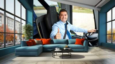 happy driver driving bus and snowing thumbs up Wall mural