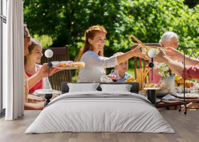 happy family having dinner or summer garden party Wall mural