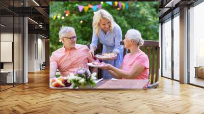 happy family having dinner or summer garden party Wall mural